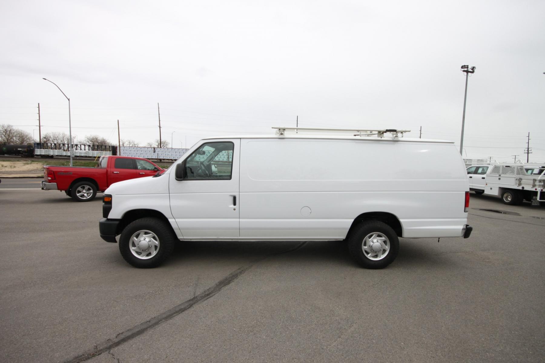 2014 White /Grey Ford E-Series Van (1FTSS3EL3ED) with an 5.4L V8 engine, Automatic transmission, located at 4562 State Avenue, Billings, MT, 59101, (406) 896-9833, 45.769516, -108.526772 - Photo #0